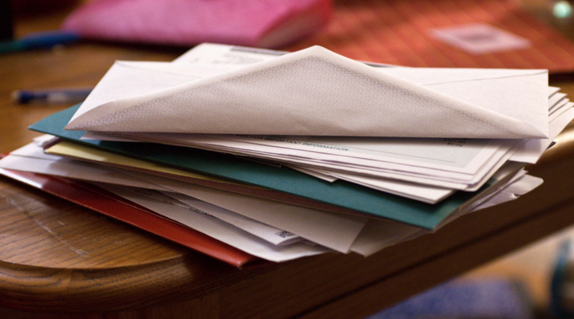 financial documents on a table in a home