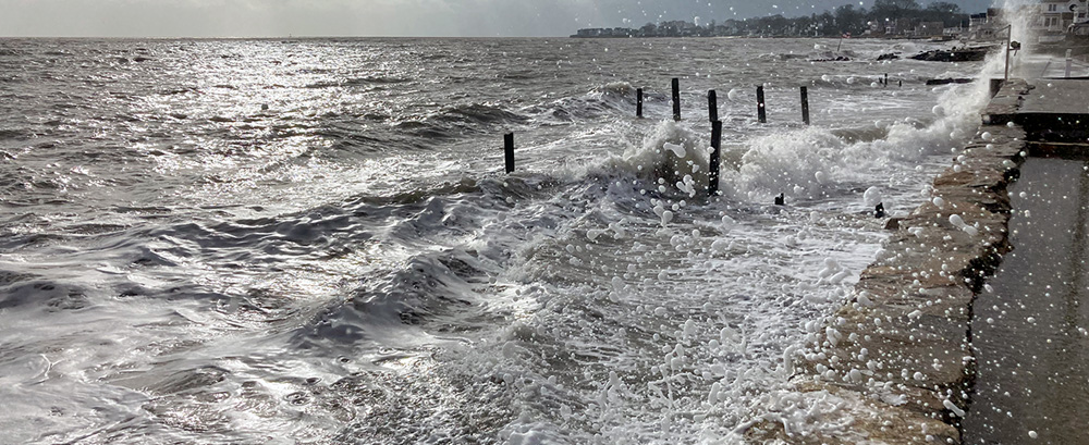 storm surge hitting the shoreline